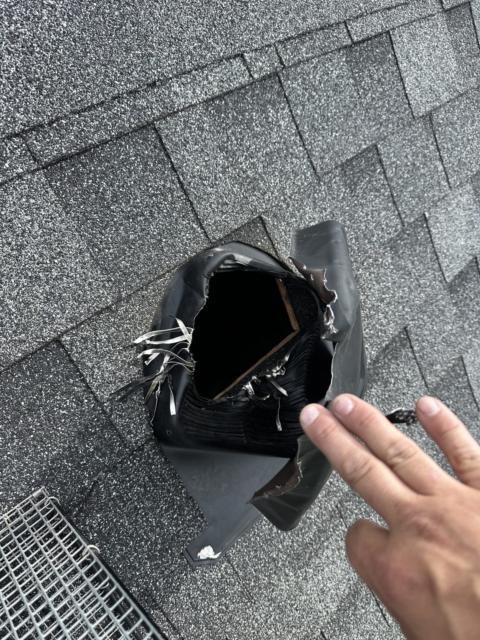 Roof vent damaged by raccoon activity